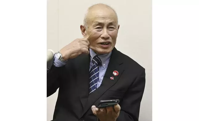 Toshiyuki Mimaki, president of Nihon Hidankyo, or the Japan Confederation of A- and H-Bomb Sufferers Organizations, reacts as he speaks to media members in Hiroshima, western Japan, Friday, Oct. 11, 2024, following Nihon Hidankyo's winning the Nobel Peace Prize. (Moe Sasaki/Kyodo News via AP)