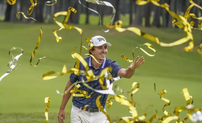 Nico Echavarria of Colombia celebrates after winning the PGA Tour Zozo Championship at the Narashino Country Club in Inzai on the outskirts of Tokyo, Sunday, Oct. 27, 2024. (AP Photo/Tomohiro Ohsumi)