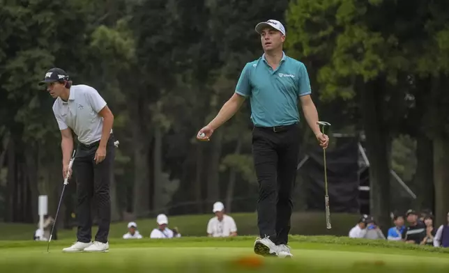 Justin Thomas of the United States reacts after a putt on the 17th hole in the third round of the PGA Tour Zozo Championship at the Narashino Country Club in Inzai on the outskirts of Tokyo, Saturday, Oct. 26, 2024. (AP Photo/Tomohiro Ohsumi)