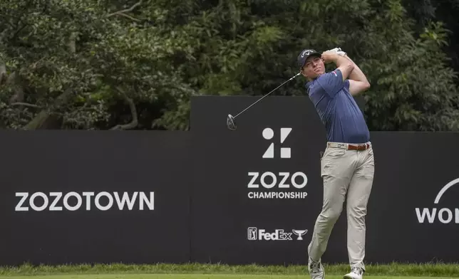 Max Greyserman of the United States hits his tee shot on the 15th hole in the third round of the PGA Tour Zozo Championship at the Narashino Country Club in Inzai on the outskirts of Tokyo, Saturday, Oct. 26, 2024. (AP Photo/Tomohiro Ohsumi)