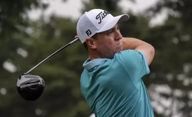 Justin Thomas of the United States hits his tee shot on the 17th hole in the third round of the PGA Tour Zozo Championship at the Narashino Country Club in Inzai on the outskirts of Tokyo, Saturday, Oct. 26, 2024. (AP Photo/Tomohiro Ohsumi)