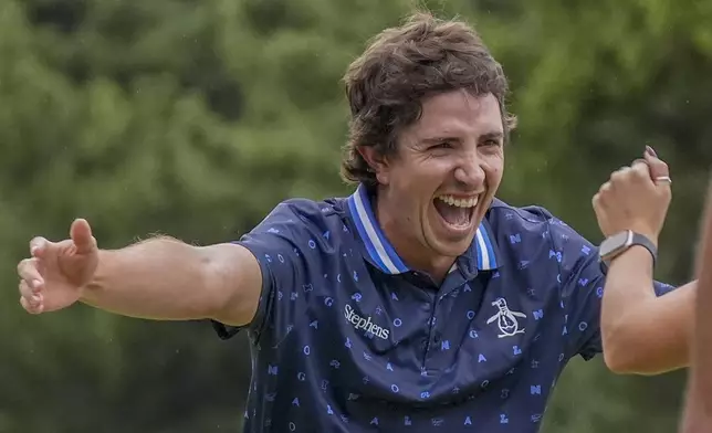 Nico Echavarria of Colombia celebrates after winning the PGA Tour Zozo Championship at the Narashino Country Club in Inzai on the outskirts of Tokyo, Sunday, Oct. 27, 2024. (AP Photo/Tomohiro Ohsumi)