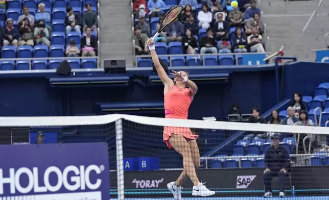 China's Zheng Qinwen plays against Russia's Diana Shnaider during the second semifinal match of the Pan Pacific Open women's tennis tournament at Ariake Coliseum, in Tokyo, Saturday, Oct. 26, 2024. (AP Photo/Eugene Hoshiko)