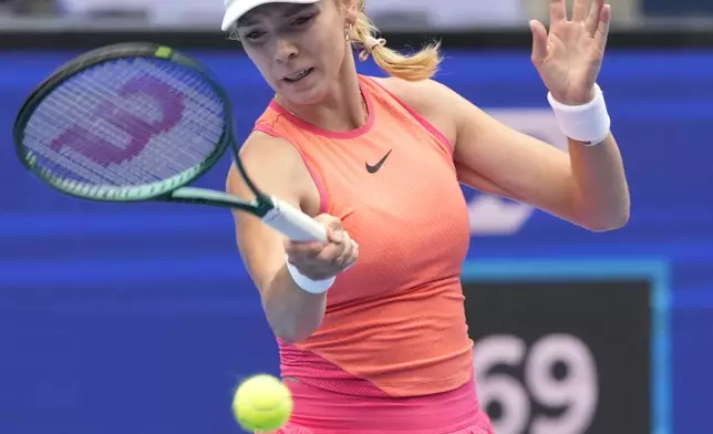 Britain's Katie Boulter plays against Sofia Kenin of the United States during the semifinal match of the Pan Pacific Open women's tennis tournament at Ariake Coliseum, in Tokyo, Saturday, Oct. 26, 2024. (AP Photo/Eugene Hoshiko)