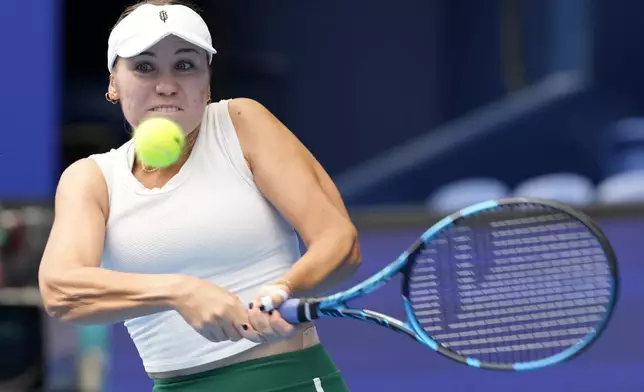 Sofia Kenin of the United States plays against Britain's Katie Boulter during the semifinal match of the Pan Pacific Open women's tennis tournament at Ariake Coliseum, in Tokyo, Saturday, Oct. 26, 2024. (AP Photo/Eugene Hoshiko)