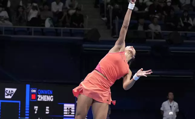 China's Zheng Qinwen plays against Sofia Kenin of the United States during the final match of the Pan Pacific Open women's tennis tournament at Ariake Coliseum, in Tokyo, Sunday, Oct. 27, 2024. (AP Photo/Eugene Hoshiko)