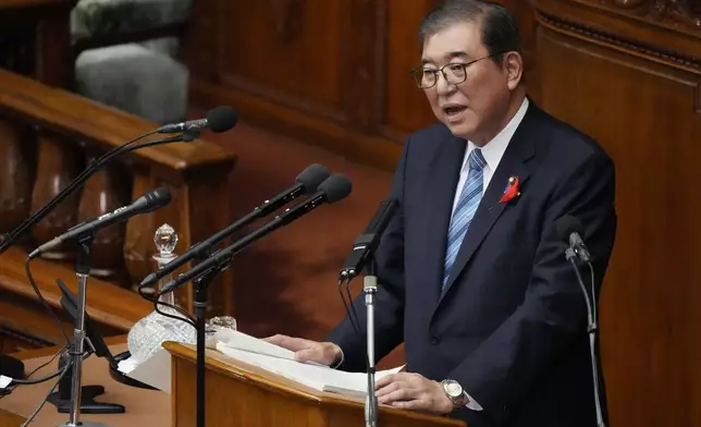 Japanese Prime Minister Shigeru Ishiba delivers his first policy speech during a Diet session at the Lower House of the Parliament Friday, Oct. 4, 2024, in Tokyo. (AP Photo/Eugene Hoshiko)