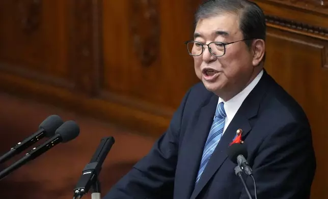 Japanese Prime Minister Shigeru Ishiba delvers his first policy speech during a Diet session at the Lower House of the Parliament Friday, Oct. 4, 2024, in Tokyo. (AP Photo/Eugene Hoshiko)