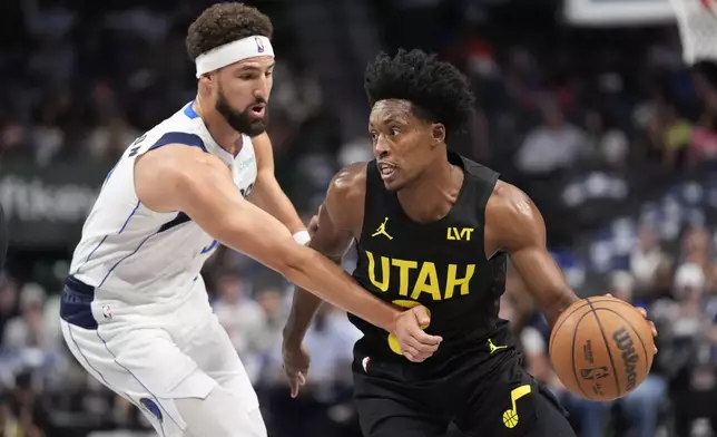 Utah Jazz guard Collin Sexton, right, drives against Dallas Mavericks guard Klay Thompson during the first half of a preseason NBA basketball game Thursday, Oct. 10, 2024, in Dallas. (AP Photo/LM Otero)