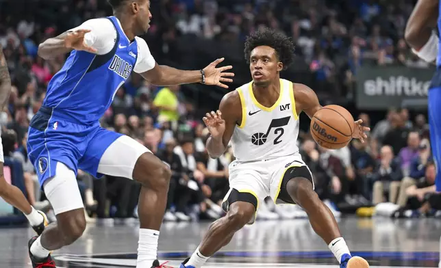 Utah Jazz guard Collin Sexton (2) drives against Dallas Mavericks forward Olivier-Maxence Prosper, left, in the first half during an NBA basketball game, Monday, Oct. 28, 2024, in Dallas. (AP Photo/Albert Pena)