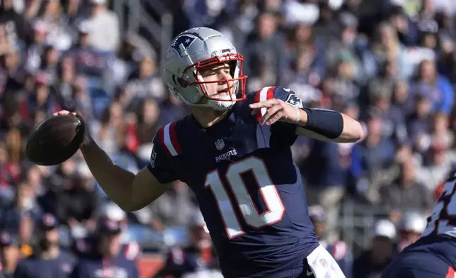 New England Patriots quarterback Drake Maye passes the ball in the first half of an NFL football game against the New York Jets, Sunday, Oct. 27, 2024, in Foxborough, Mass. (AP Photo/Michael Dwyer)