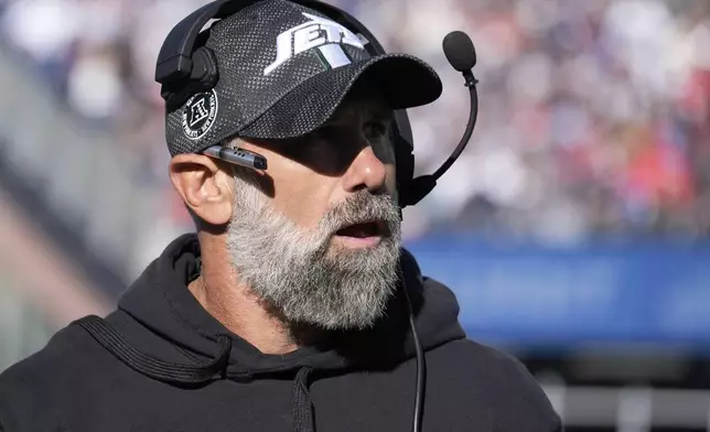 New York Jets interim head coach Jeff Ulbrich shouts to his players from the sidelines in the first half of an NFL football game against the New England Patriots, Sunday, Oct. 27, 2024, in Foxborough, Mass. (AP Photo/Michael Dwyer)