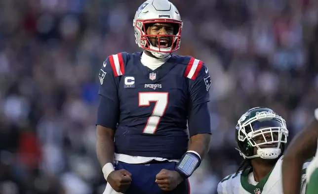 New England Patriots quarterback Jacoby Brissett (7) celebrates after Patriots running back Rhamondre Stevenson ran for a touchdown in the second half of an NFL football game against the New York Jets, Sunday, Oct. 27, 2024, in Foxborough, Mass. (AP Photo/Charles Krupa)