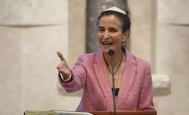 Gayle Pomerantz, senior rabbi at Temple Beth Sholom, speaks during a Shabbat service, Friday, Sept. 27, 2024, in Miami Beach, Fla. (AP Photo/Wilfredo Lee)