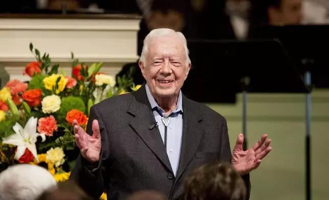 FILE - Former President Jimmy Carter teaches Sunday School class at the Maranatha Baptist Church in his hometown of Plains, Ga., Aug. 23, 2015. (AP Photo/David Goldman, File)