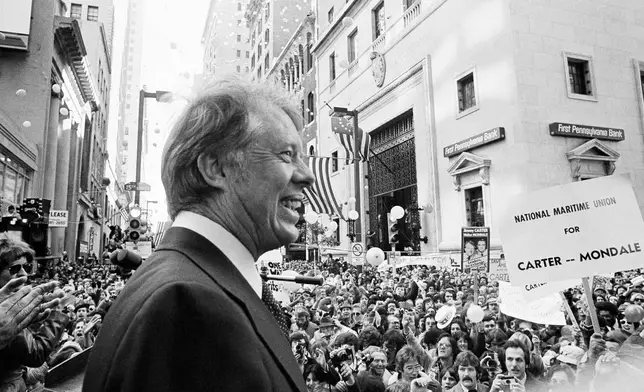 FILE - An estimated crowd of 35,000 people gather for a noontime speech by Presidential candidate Jimmy Carter in downtown Philadelphia, Oct. 29, 1976. (AP Photo, File)