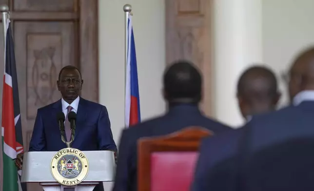 Kenya's President William Ruto, speaks during a joint press conference with Haiti Prime Minister Garry Conille at State House in Nairobi, Kenya, Friday, Oct. 11, 2024. (AP Photo/Brian Inganga)