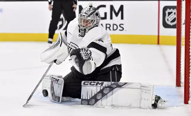 Los Angeles Kings goaltender David Rittich (31) defends the net against the Vegas Golden Knights during the second period of an NHL hockey game Tuesday, Oct. 22, 2024, in Las Vegas. (AP Photo/David Becker)