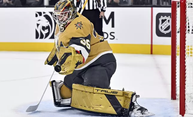 Vegas Golden Knights goaltender Ilya Samsonov (35) defends the net against the Los Angeles Kings during the first period of an NHL hockey game Tuesday, Oct. 22, 2024, in Las Vegas. (AP Photo/David Becker)