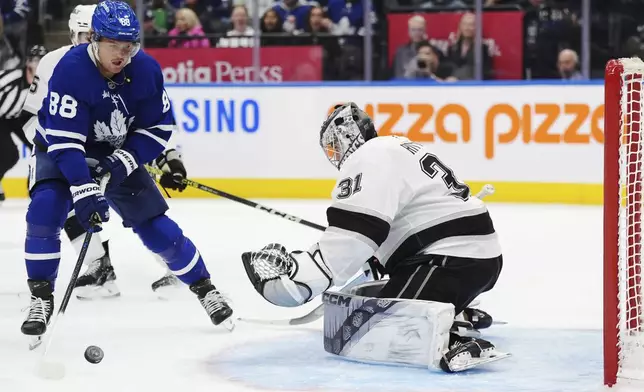 Toronto Maple Leafs' William Nylander (88) is stopped by Los Angeles Kings goaltender David Rittich (31) during the second period of an NHL hockey game in Toronto, Wednesday, Oct. 16, 2024. (Frank Gunn/The Canadian Press via AP)