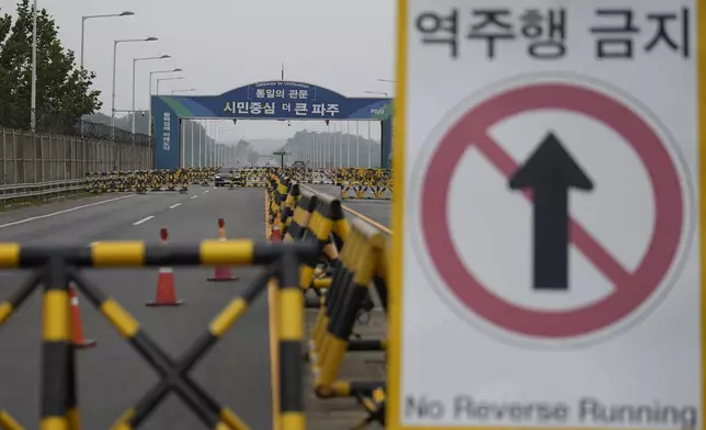 Barricades are placed near the Unification Bridge, which leads to the Panmunjom in the Demilitarized Zone in Paju, South Korea, Tuesday, Oct. 15, 2024. (AP Photo/Lee Jin-man)