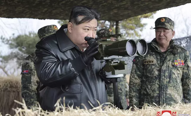 FILE - In this photo provided by the North Korean government, North Korean leader Kim Jong Un, left, supervises artillery firing drills in North Korea, on March 7, 2024. Independent journalists were not given access to cover the event depicted in this image distributed by the North Korean government. The content of this image is as provided and cannot be independently verified. Korean language watermark on image as provided by source reads: "KCNA" which is the abbreviation for Korean Central News Agency. (Korean Central News Agency/Korea News Service via AP, File)