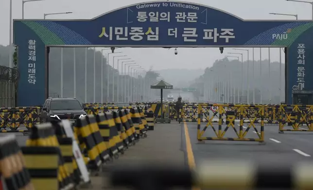 Barricades are placed near the Unification Bridge, which leads to the Panmunjom in the Demilitarized Zone in Paju, South Korea, Tuesday, Oct. 15, 2024. (AP Photo/Lee Jin-man)