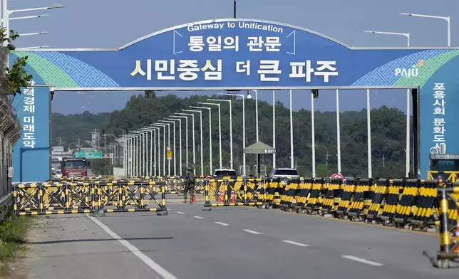 Barricades are placed near the Unification Bridge, which leads to the Panmunjom in the Demilitarized Zone in Paju, South Korea, Wednesday, Oct. 9, 2024. (AP Photo/Lee Jin-man)