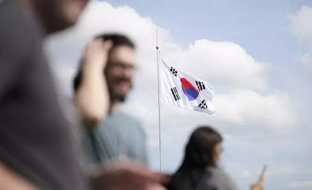 A South Korean national flag flutters in the wind at the Unification Observation Post in Paju, South Korea, Wednesday, Oct. 9, 2024. (AP Photo/Lee Jin-man)