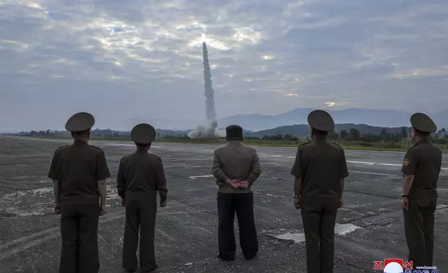 FILE - In this photo provided by the North Korean government, North Korean leader Kim Jong Un, center, oversees a launch of, what it says, the country's newly built Hwasongpho-11-Da-4.5 ballistic missile at an undisclosed place in North Korea, Sept. 18, 2024. Independent journalists were not given access to cover the event depicted in this image distributed by the North Korean government. The content of this image is as provided and cannot be independently verified. Korean language watermark on image as provided by source reads: "KCNA" which is the abbreviation for Korean Central News Agency. (Korean Central News Agency/Korea News Service via AP, File)