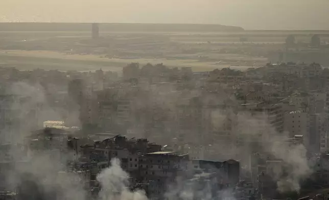 Smoke rises from an Israeli airstrike in Dahiyeh, Beirut, Sunday, Oct. 27, 2024. (AP Photo/Hassan Ammar)