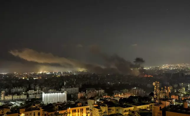 Smoke rises after Israeli airstrikes in Dahiyeh, Beirut, Lebanon, Saturday, Oct. 5, 2024. (AP Photo/Bilal Hussein)