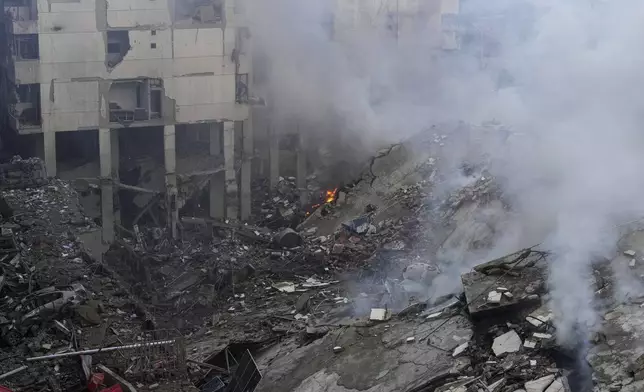 Smoke rises from the site of an Israeli airstrike in Beirut's southern suburb, Lebanon, Tuesday, Oct. 1, 2024. (AP Photo/Hassan Ammar)