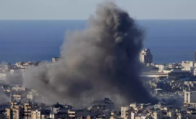 Smoke rises from Israeli airstrikes on Dahiyeh, in the southern suburb of Beirut, Lebanon, Saturday, Oct. 19, 2024. (AP Photo/Hussein Malla)