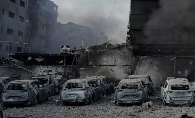 Charred cars at the site of an Israeli airstrike in Dahiyeh, Beirut, Lebanon, Sunday, Oct. 6, 2024. (AP Photo/Bilal Hussein)