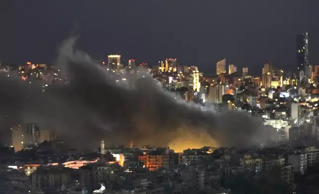 Smoke rises after Israeli airstrikes on Dahiyeh, a southern suburb of Beirut, Lebanon, early Sunday, Oct. 20, 2024. (AP Photo/Hussein Malla)