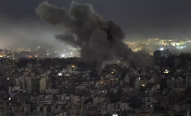 Smoke rises from an Israeli airstrike on Dahiyeh, in the southern suburb of Beirut, Lebanon, Sunday, Oct. 20, 2024. (AP Photo/Hussein Malla)