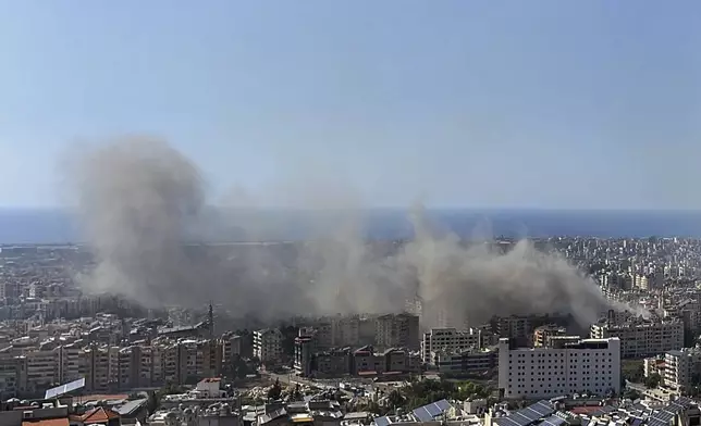 Smoke rises after Israeli airstrikes in Dahiyeh, Beirut, Lebanon, Thursday, Oct. 3, 2024. (AP Photo/Fadi Tawil)