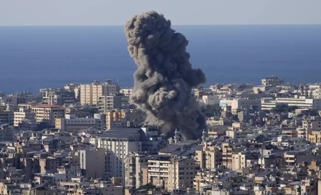 Smoke rises from an Israeli airstrike on Dahiyeh, in the southern suburb of Beirut, Lebanon, Saturday, Oct. 19, 2024. (AP Photo/Hussein Malla)
