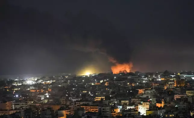 Flames and smoke rise from an Israeli airstrike on Dahiyeh in the southern suburb of Beirut, Tuesday, Oct. 22, 2024. (AP Photo/Bilal Hussein)