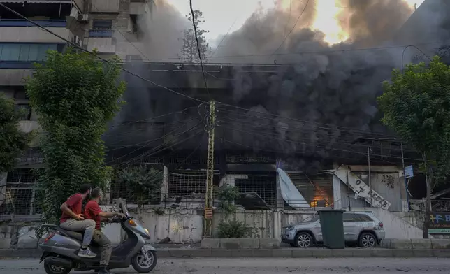 Smoke rises from a destroyed building at the site of an Israeli airstrike in Dahiyeh, Beirut, Lebanon, Sunday, Oct. 6, 2024. (AP Photo/Bilal Hussein)