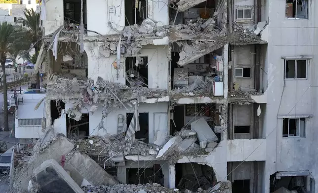 A destroyed apartment at the site of an Israeli airstrike in Dahiyeh, Beirut, Lebanon, Monday, Oct. 21, 2024. (AP Photo/Hassan Ammar)