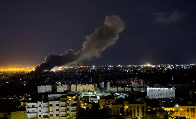 Smoke rises from an Israeli airstrike that hit the southern suburb of Beirut, Lebanon, Tuesday, Oct. 1, 2024. (AP Photo/Hussein Malla)