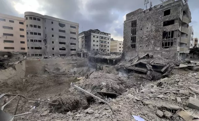 A view of destroyed buildings hit by Israeli airstrikes in Dahiyeh, Beirut, Lebanon, Monday, Oct. 7, 2024. (AP Photo/Hussein Malla)