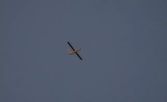 An Israeli drone flies over Beirut, Tuesday, Oct. 29, 2024. (AP Photo/Hassan Ammar)