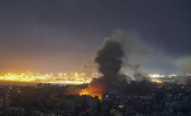 Smoke rises from an Israeli airstrike in Dahiyeh, Beirut, Lebanon, Tuesday, Oct. 22, 2024. (AP Photo/Hassan Ammar)