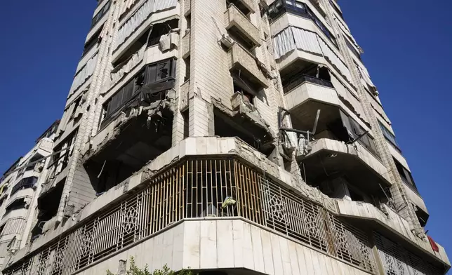 A destroyed apartment in a multistory building hit by Israeli airstrike, in central Beirut, Lebanon, Thursday, Oct. 3, 2024. (AP Photo/Hussein Malla)