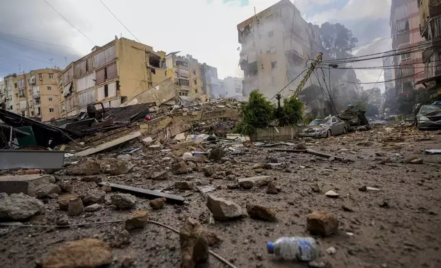 Smoke rises from the site of an Israeli airstrike in Beirut's southern suburb, Lebanon, Tuesday, Oct. 1, 2024. (AP Photo/Hassan Ammar)