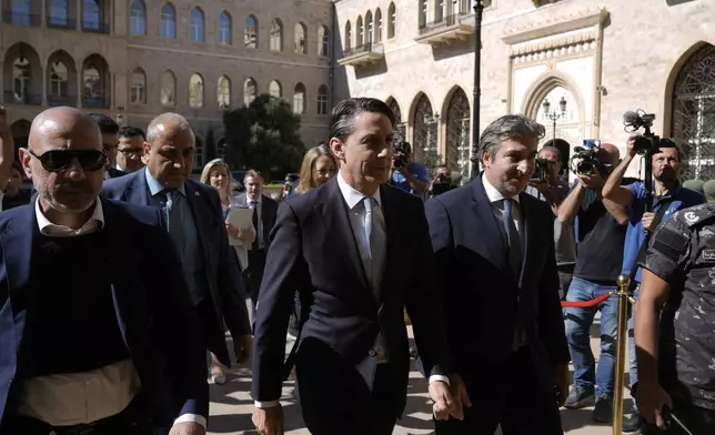 U.S. envoy Amos Hochstein, center, arrives at the government house ahead of a meeting with Lebanese caretaker Prime Minister Najib Mikati in Beirut, Lebanon, Monday, Oct. 21, 2024. (AP Photo/Bilal Hussein)