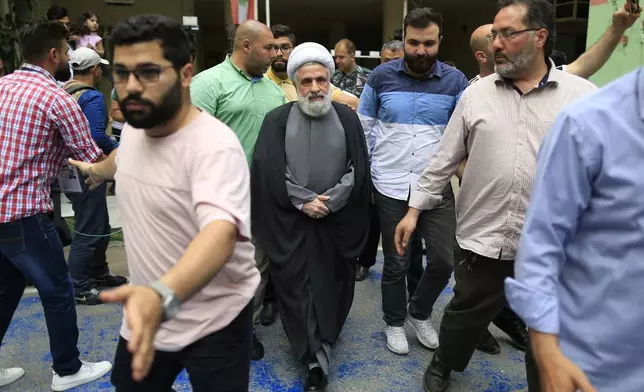 FILE - Hezbollah's deputy leader, Sheikh Naim Kassem, after casting his vote during Lebanon's parliamentary elections in Beirut, Sunday, May 6, 2018. (AP Photo/Hassan Ammar, File)